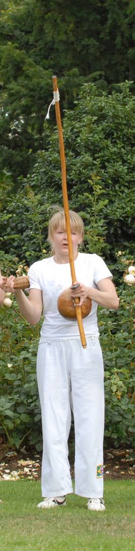 Justyna playing berimbau
